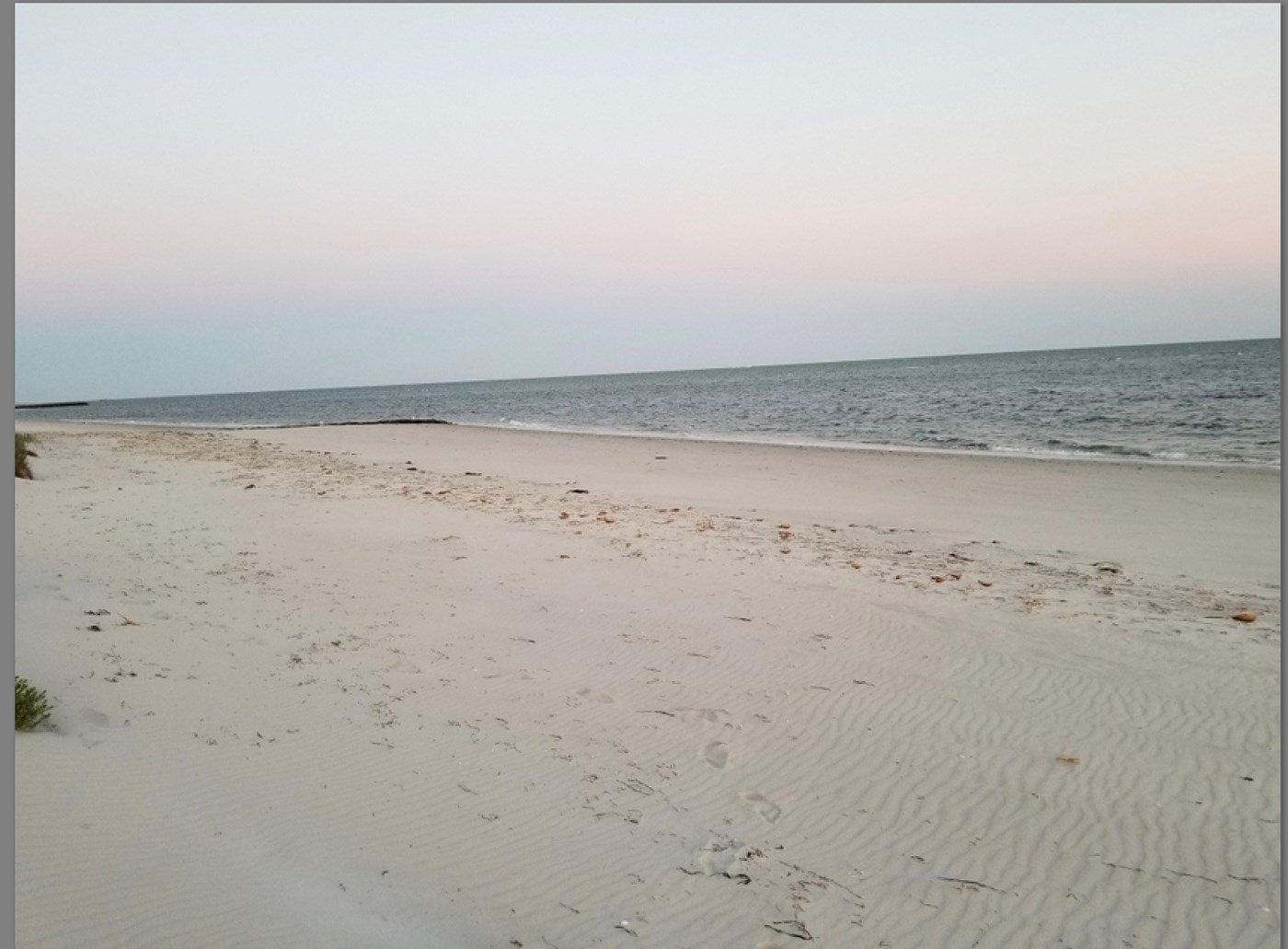 Private white-sand beach at 35 Powers